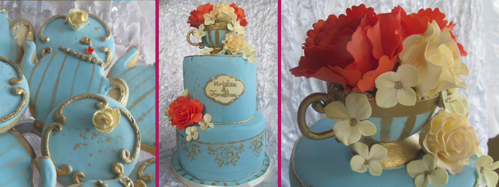 Vintage two tierd french blue cake with gold accented tecup filled with with cream and coral sugarflowers